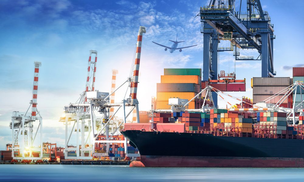 bigstock--187881256 Logistics and transportation of International Container Cargo ship and cargo plane in the ocean at twilight sky Freight Transportation Shipping